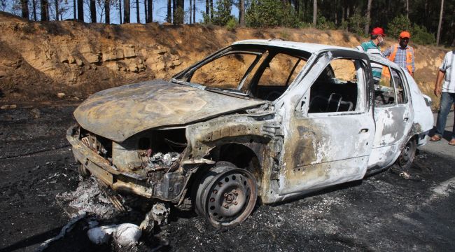 Otomobilde çıkan yangın ormanlık alana sıçradı