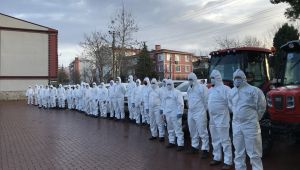 Beyaz tulumlular dezenfeksiyon mesaisinde