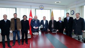 Akademisyenlerden Tabakoğlu’na kitap hediyesi