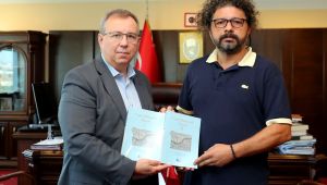 Kayıcı’dan Tabakoğlu’na kitap takdimi