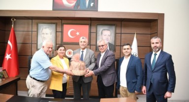 Bakan Bolat’tan Helvacıoğlu’na ziyaret