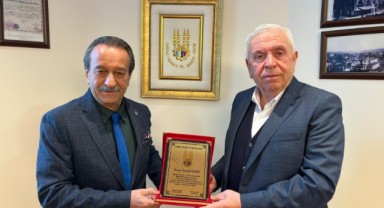 Eser’e plaketli veda