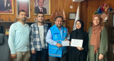 TÜ öğrencileri kermes gelirini Filistin'e bağışladı