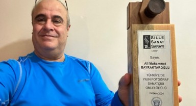 Bayraktaroğlu’na Yılın Fotoğrafçısı Onur Ödülü